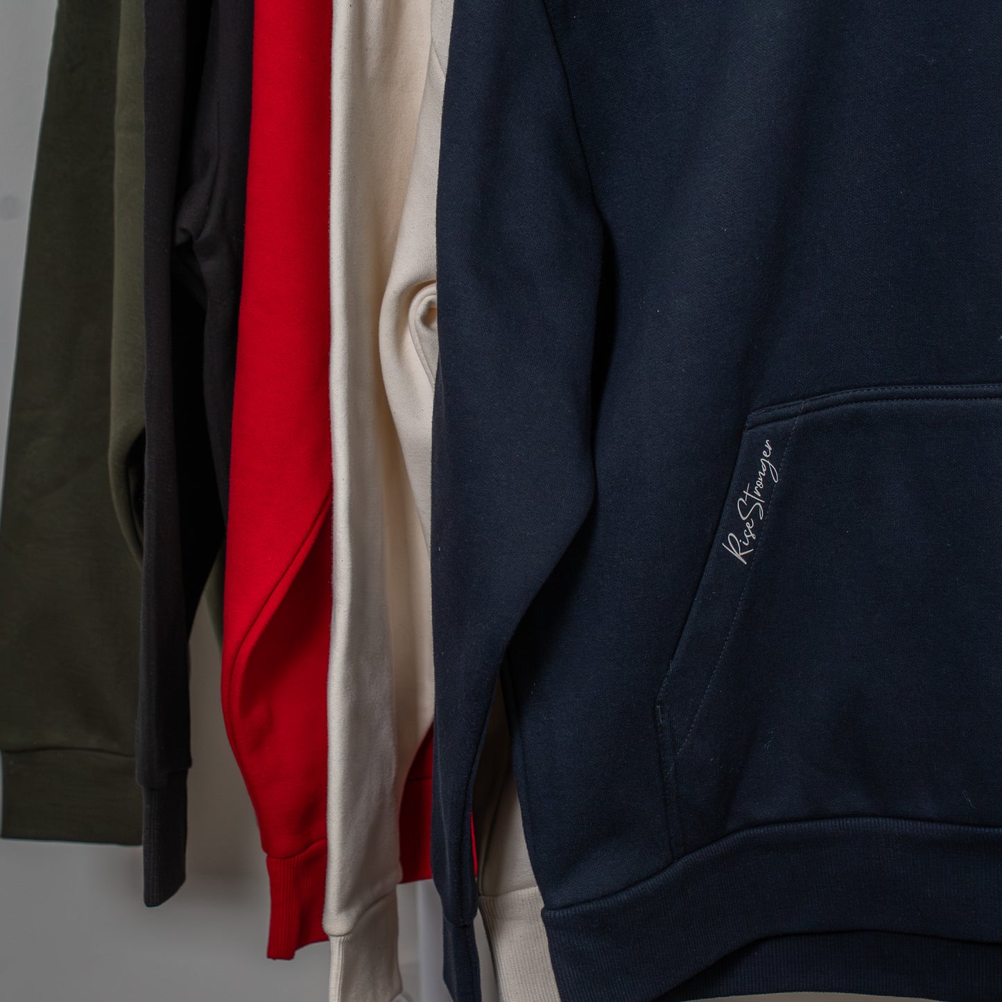 Close-up of soft heavyweight fabric and ribbed cuffs on the 3:16 hoodie  