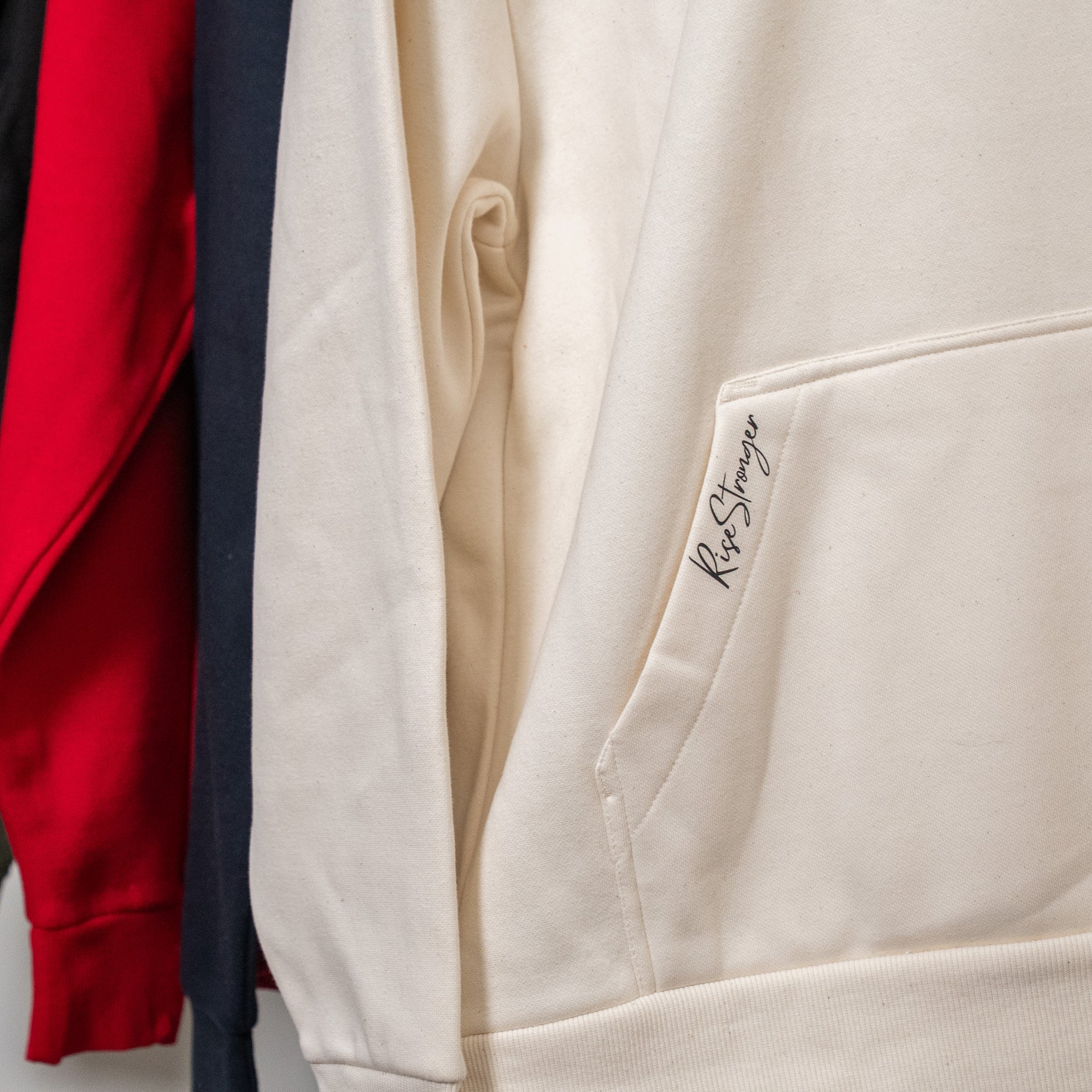 Folded 3:16 heavyweight hoodie displaying logo tag and fabric texture