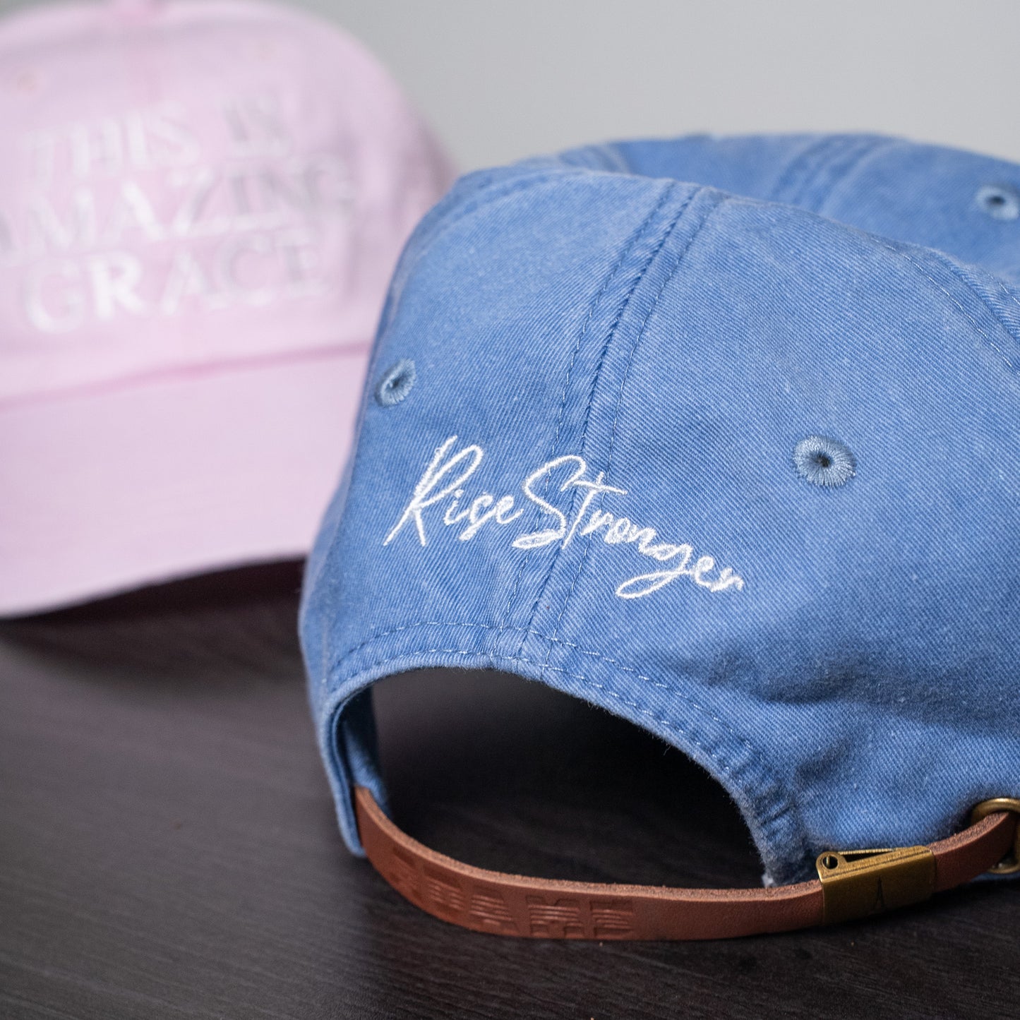 Close-up of detailed embroidery on the front panel of the premium faith-inspired hat  