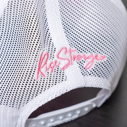 Flexible and breathable pink hat with white mesh panels and faith-inspired embroidered design  