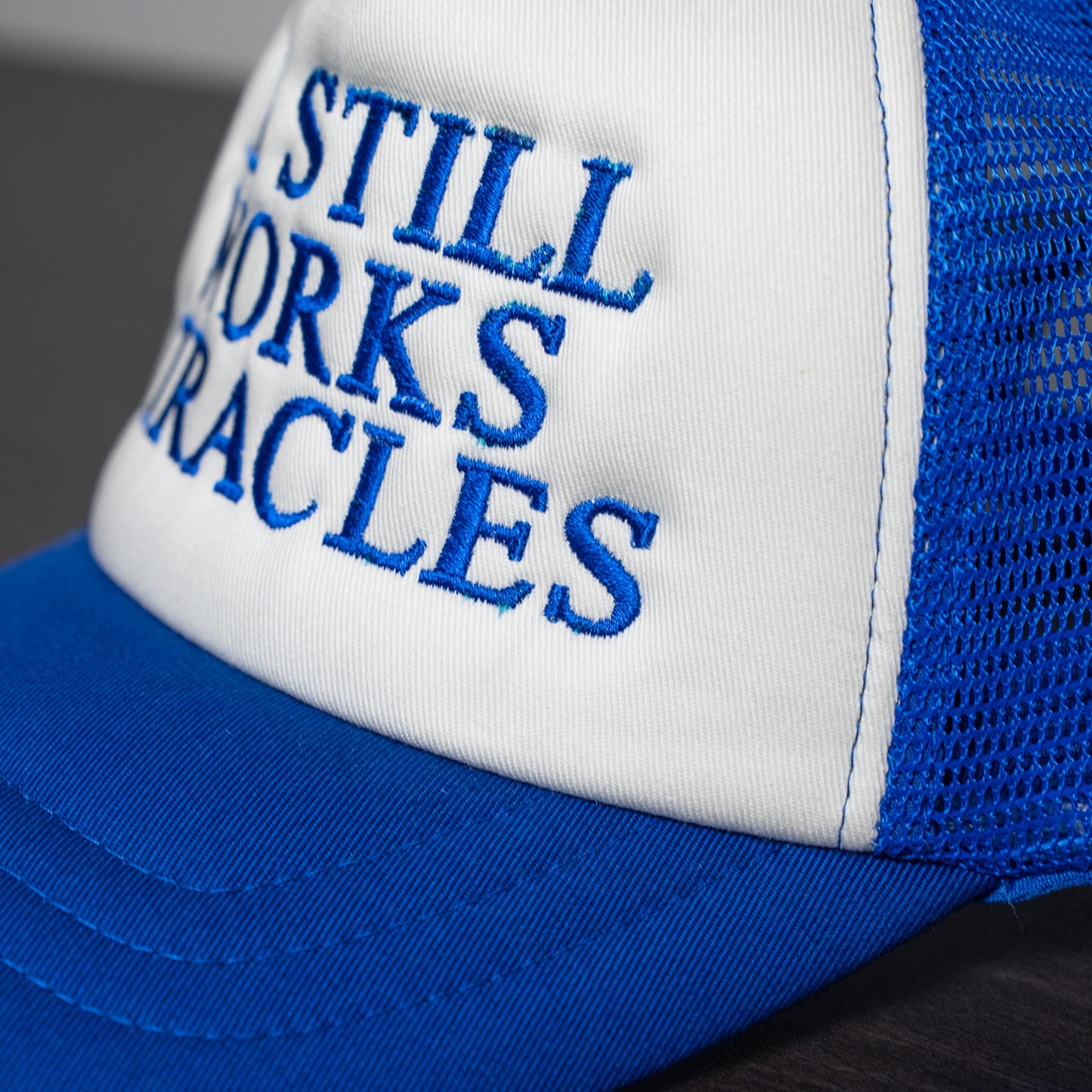 Pink trucker cap showing lightweight mesh back that ensures maximum airflow and comfort  