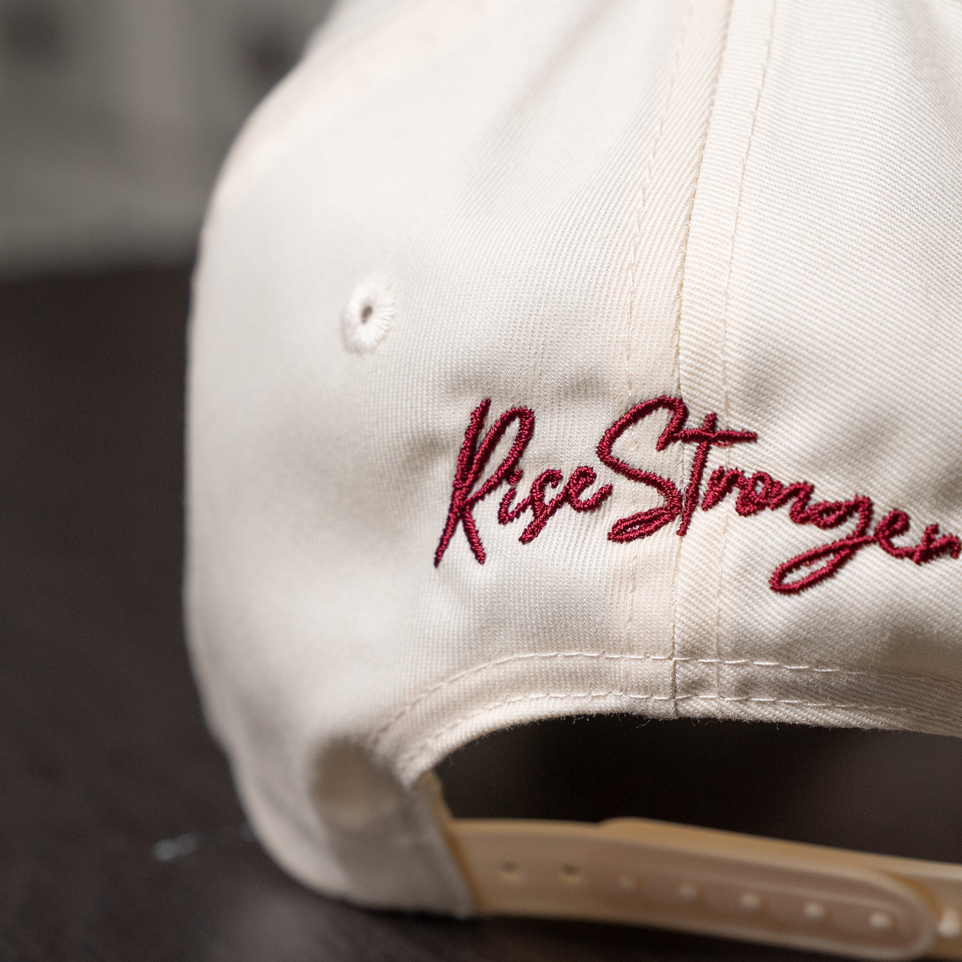 Back view highlighting adjustable metal closure and breathable fabric of spiritual cap  
