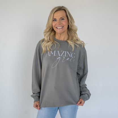 Front view of the Amazing Grace crewneck sweatshirt in light grey fabric  
