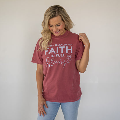 Close-up of inspirational scripture text printed on the Victory Revealed shirt  
