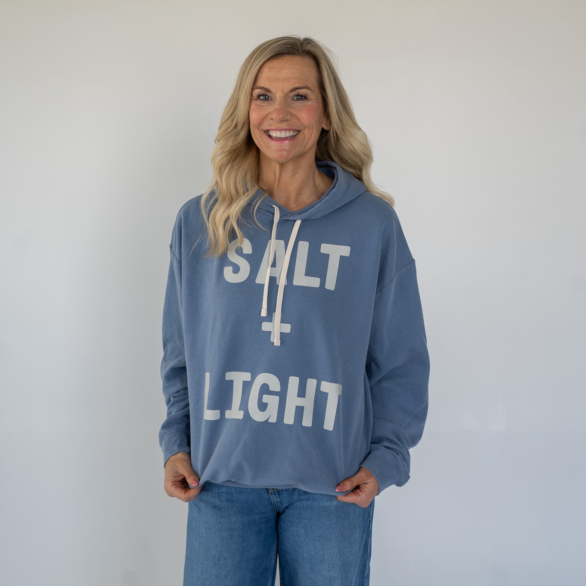 Front view of SALT + LIGHT unisex hoodie in soft fabric and relaxed fit  
