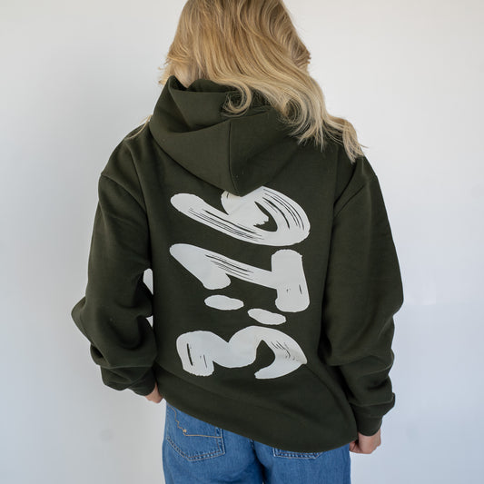 Unisex heavyweight hoodie in charcoal gray with bold 3:16 brushstroke print on the back  