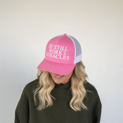 He Still Works Miracles Trucker Cap