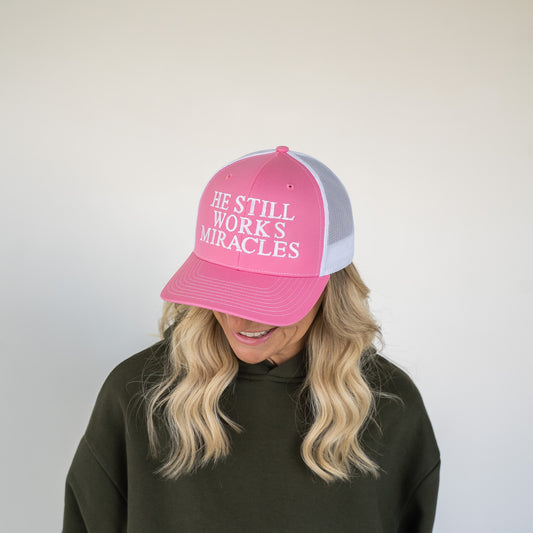 He Still Works Miracles Trucker Cap