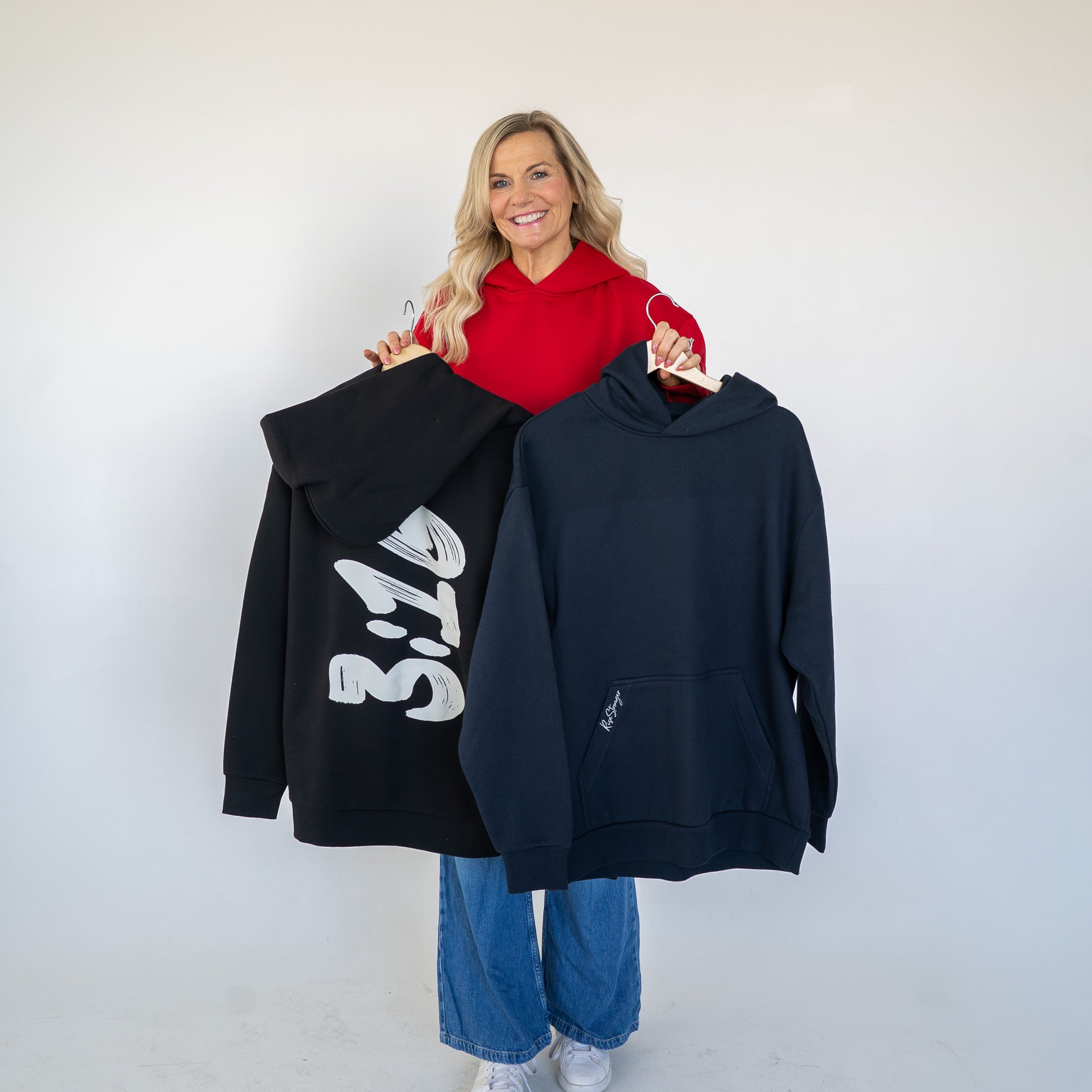 Side angle of heavyweight hoodie showing durable stitching details  