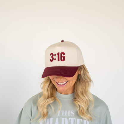 White five-panel cap with black embroidered "3:16" on front panel, adjustable back strap visible  