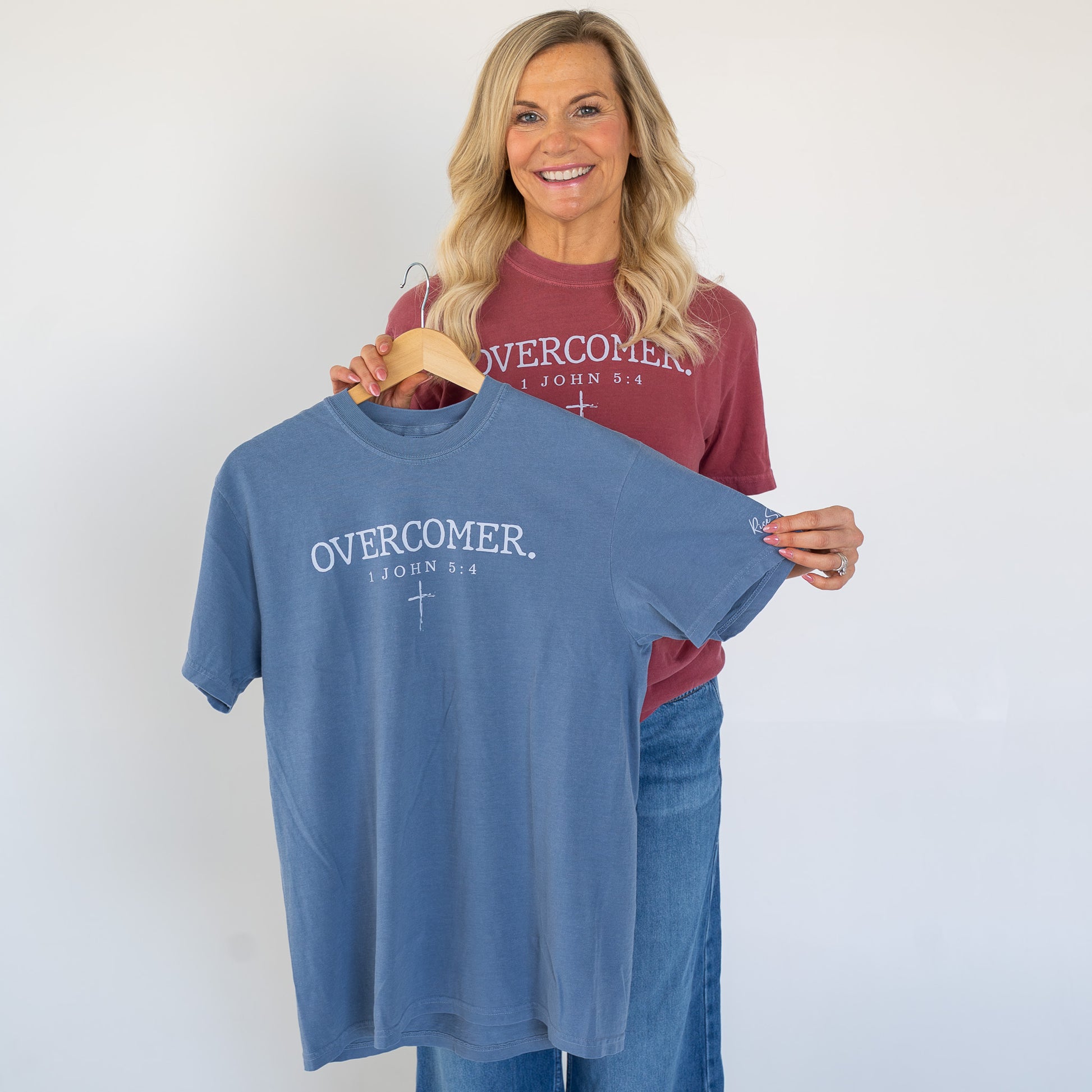 Back view of the Overcomer Tee highlighting its comfortable fit for women  