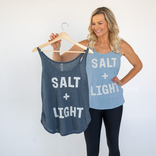 Close-up of soft fabric and inspirational Christian design on women’s summer tank top  