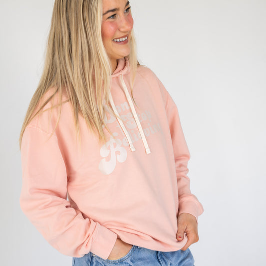 Soft fabric hoodie displayed on mannequin with classic fit and hood  