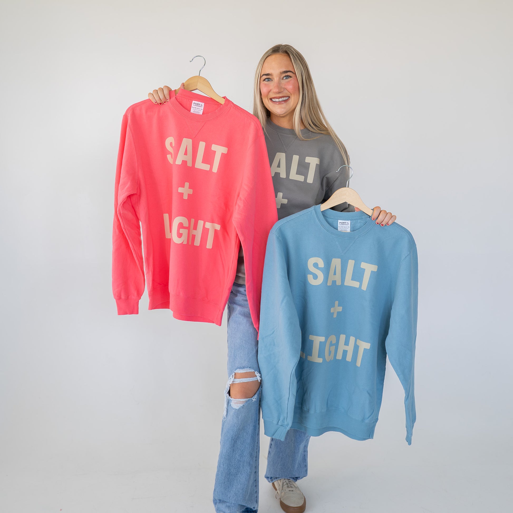 Front view of the Salt + Light sweatshirt highlighting relaxed fit and crewneck design  