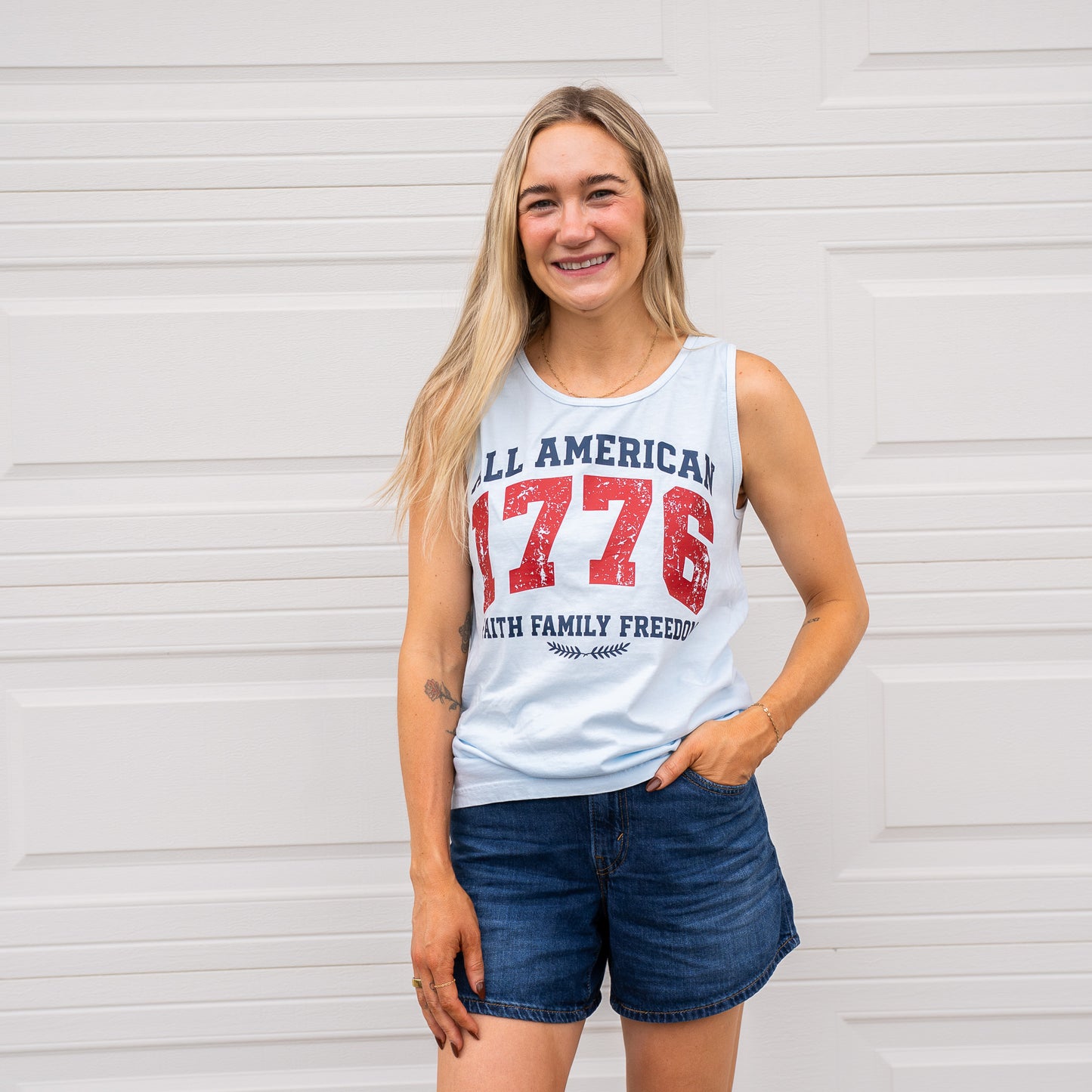 Side view showcasing comfortable fit of women's 1776 All American tank top  