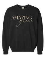 Black colored Christian crew sweatshirt with 'Amazing Grace' across the chest in cream color.  
