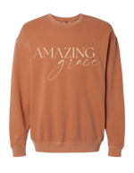 Yam colored Christian crewneck sweatshirt with Amazing Grace across the chest in cream color.  