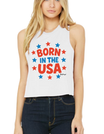 Woman wearing the Born in the USA women’s patriotic racerback crop tank