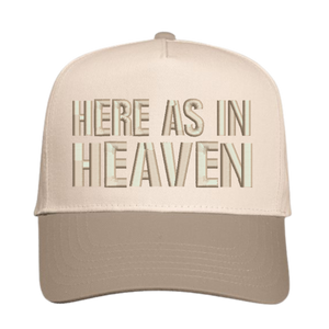 Beige cap with 'HERE AS IN HEAVEN' text 