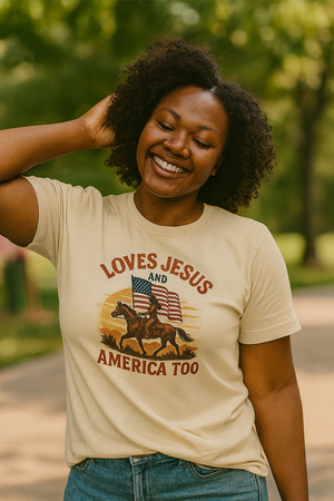 Woman wearing a Christian patriotic t-shirt with an American flag and text that reads Loves Jesus and America Too. 