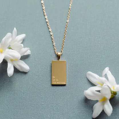 Faith-based gold necklace with engraved message – He Is in the Waiting