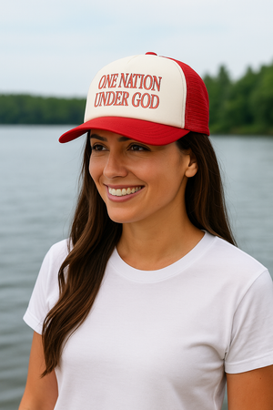 Female wearing a unisex Christian trucker hat with mesh back and snapback fit

