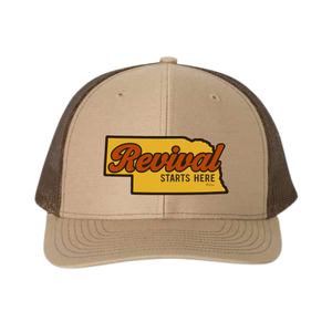 Khaki/Coffee trucker cap with 'Revival Starts Here' overlaying the state of Nebraska. 