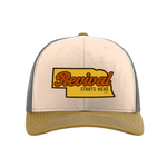 Beige and gray trucker cap with 'Revival Starts Here' overlaying the state of Nebraska. 