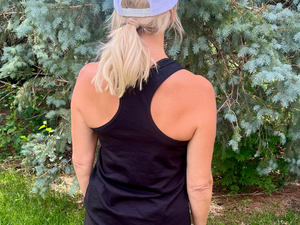 Backside view of Don’t Stop Believing Christian women’s racerback tank