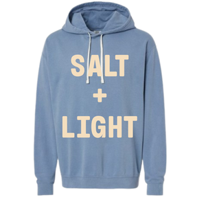 Blue Christian hoodie with 'Salt + Light' text on the front in cream color.