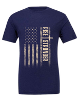 Christian Patriotic tee in navy blue with tattered American flag, a cross and Rise Stronger text on the front in cream color.