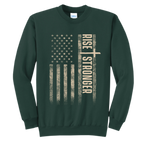 Christian crewneck sweatshirt with tattered American flag and Rise Stronger on the front in cream color over a dark green garment.