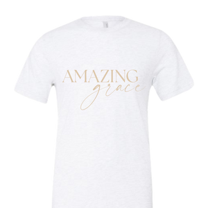 White Christian t-shirt with 'Amazing Grace' printed in gold.