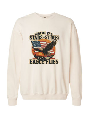 A cream colored Christian & patriotic crewneck sweatshirt with Where the Stars & Stripes and Eagle Flies on the front. 