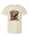 A cream colored Christian & patriotic t-shirt with 'Where the Stars & Stripes and Eagle Flies' on the front. 