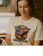 Patriotic woman wearing a t-shirt with an eagle and American flag design.
